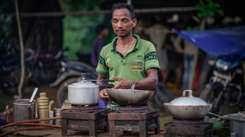 Street Food Vendor Cooking at Outdoor Stall in India